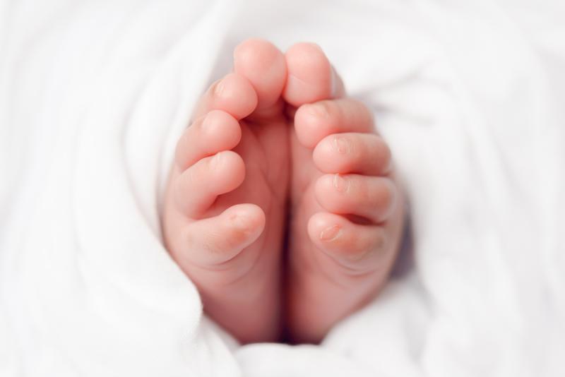 newborn posing feet