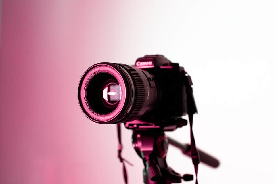 Canon camera with soft pink light 