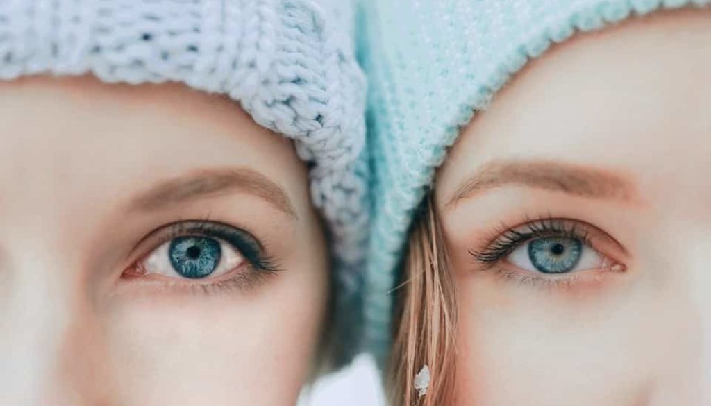 two woman with blue eyes