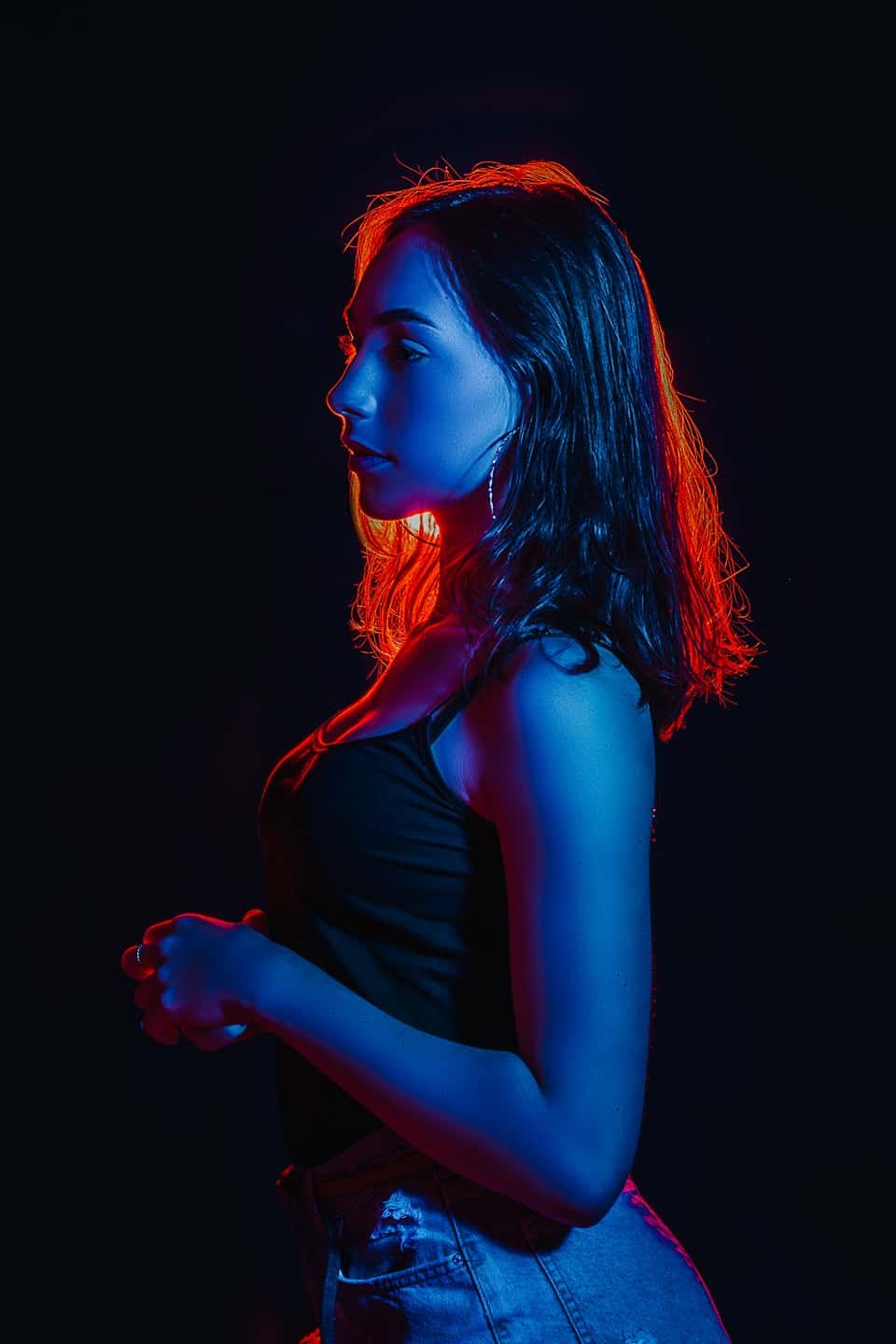 woman lit red and blue