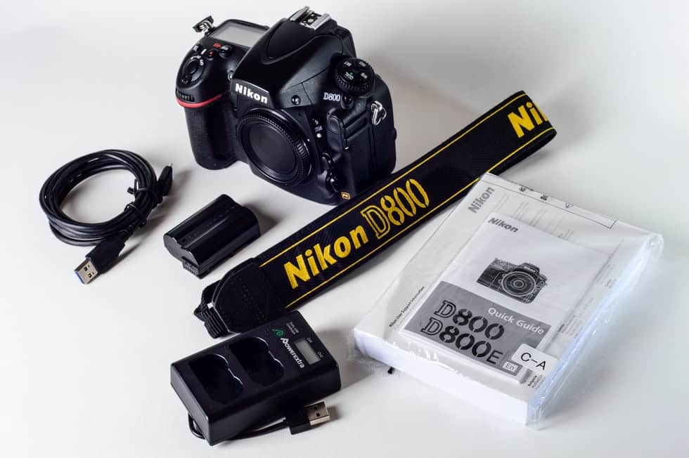 nikon kit with camera, battery and accessories