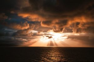 sun rays over ocean