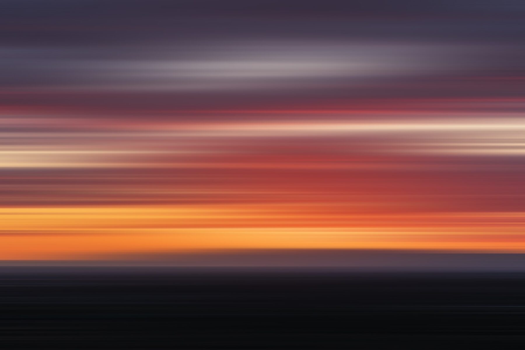 Blurry sunset. Photo by Andrew Ruiz on Unsplash